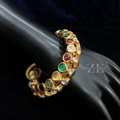 Polki Navratna Bangles in 18K Gold with Syndicate Uncut Diamond Polki and Navratna Stones