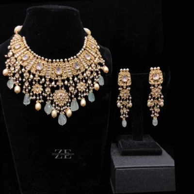 Jadau Big Polki Bridal Necklace set with massive uncut diamonds, cultured pearls, and beryl Russian emerald drops.